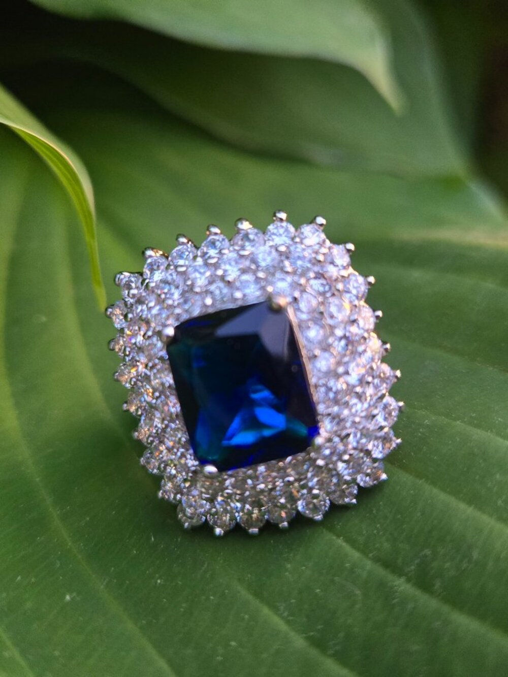 Entrancing 925 Coctail Ring with emerald-cut center stone